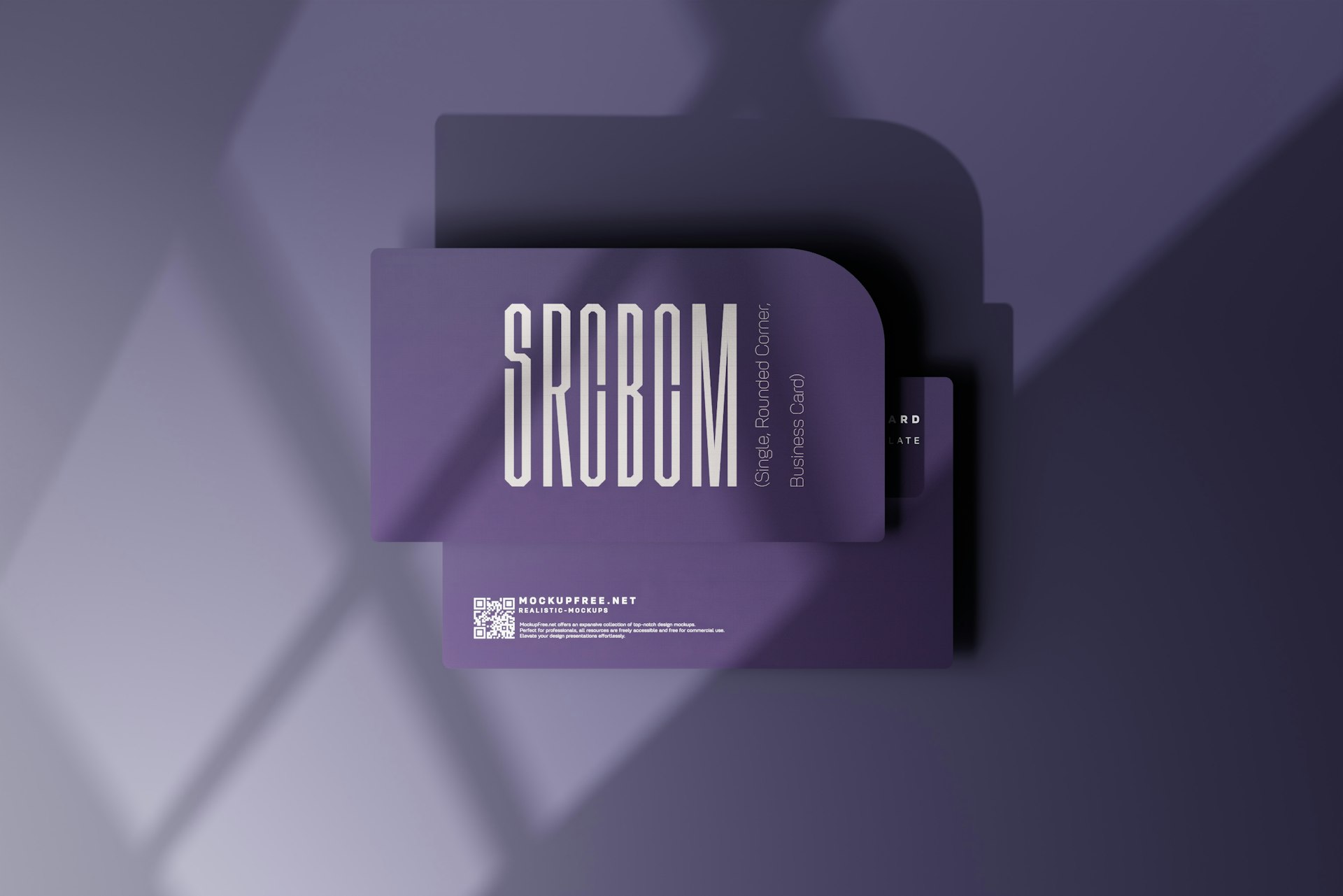 a book with a shadow on a purple background